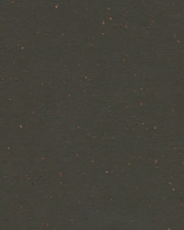 Antracietkleurig marmoleum met een subtiel gespikkelde structuur.